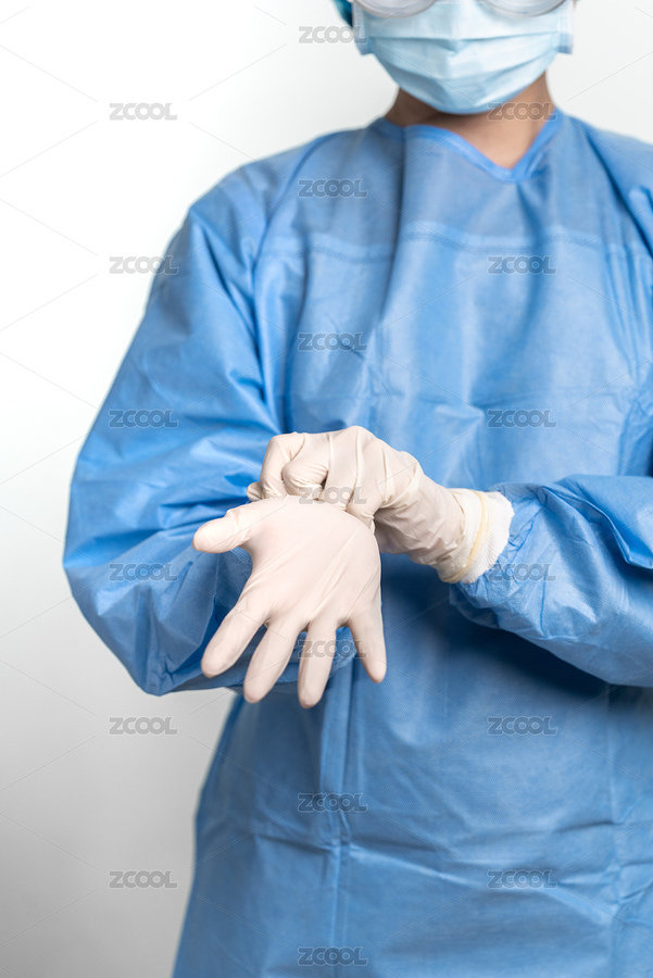 身穿隔離衣的醫(yī)務(wù)人員在戴手套（主預(yù)覽-3732845） - 未分類 - 站酷設(shè)計(jì)師Anciens原創(chuàng)素材 - 站酷ZCOOL