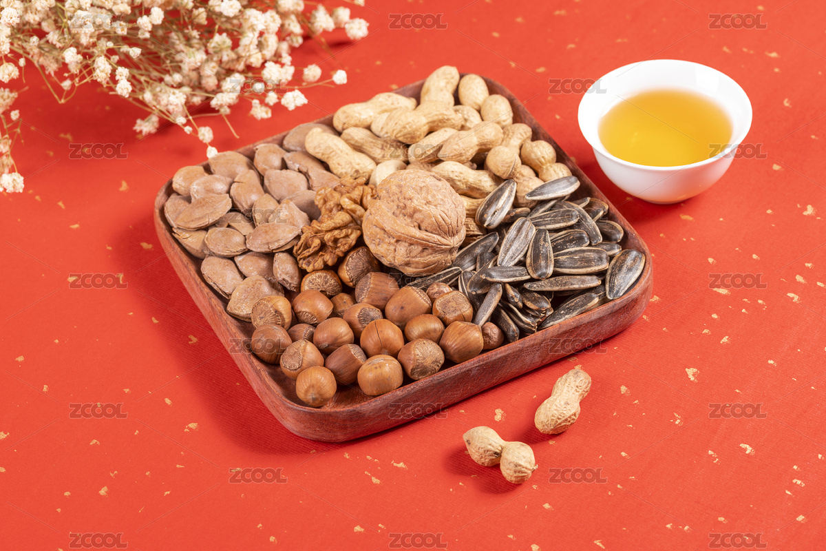 干果果盤擺放在桌面上旁邊放有茶水（主預(yù)覽-8602101） - 未分類 - 站酷設(shè)計師金翅大鵬原創(chuàng)素材 - 站酷ZCOOL