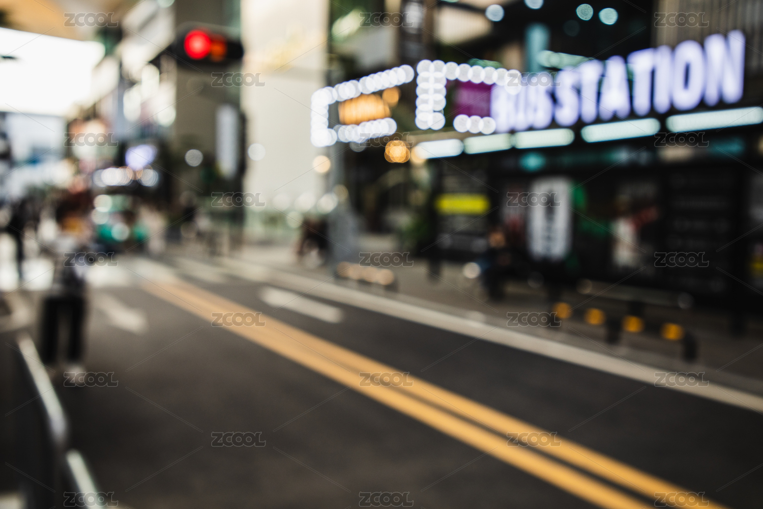 Blurred city scenery with people walking at the street