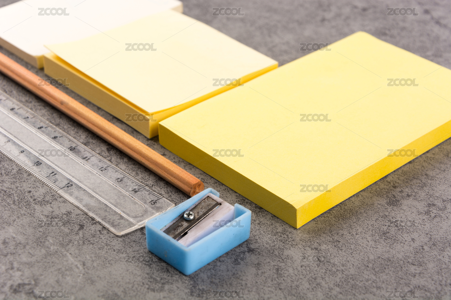Colorful stationery on wooden background