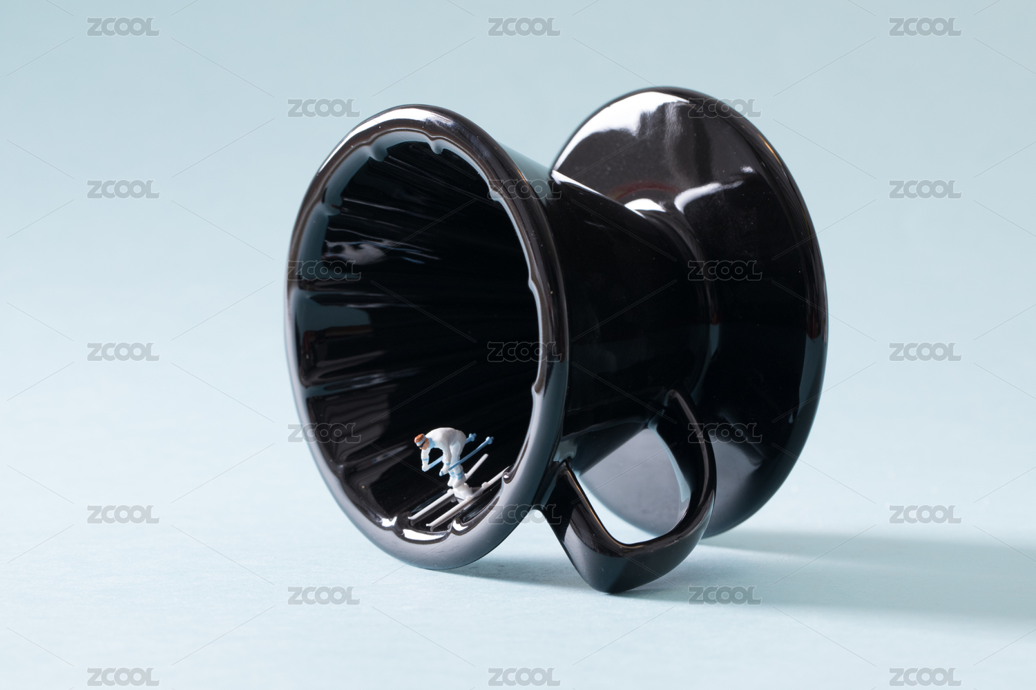 coffee beans with coffee powder on blue background Coffee pot