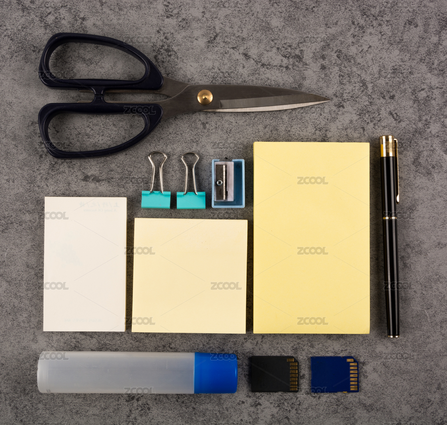 Colorful stationery on wooden background