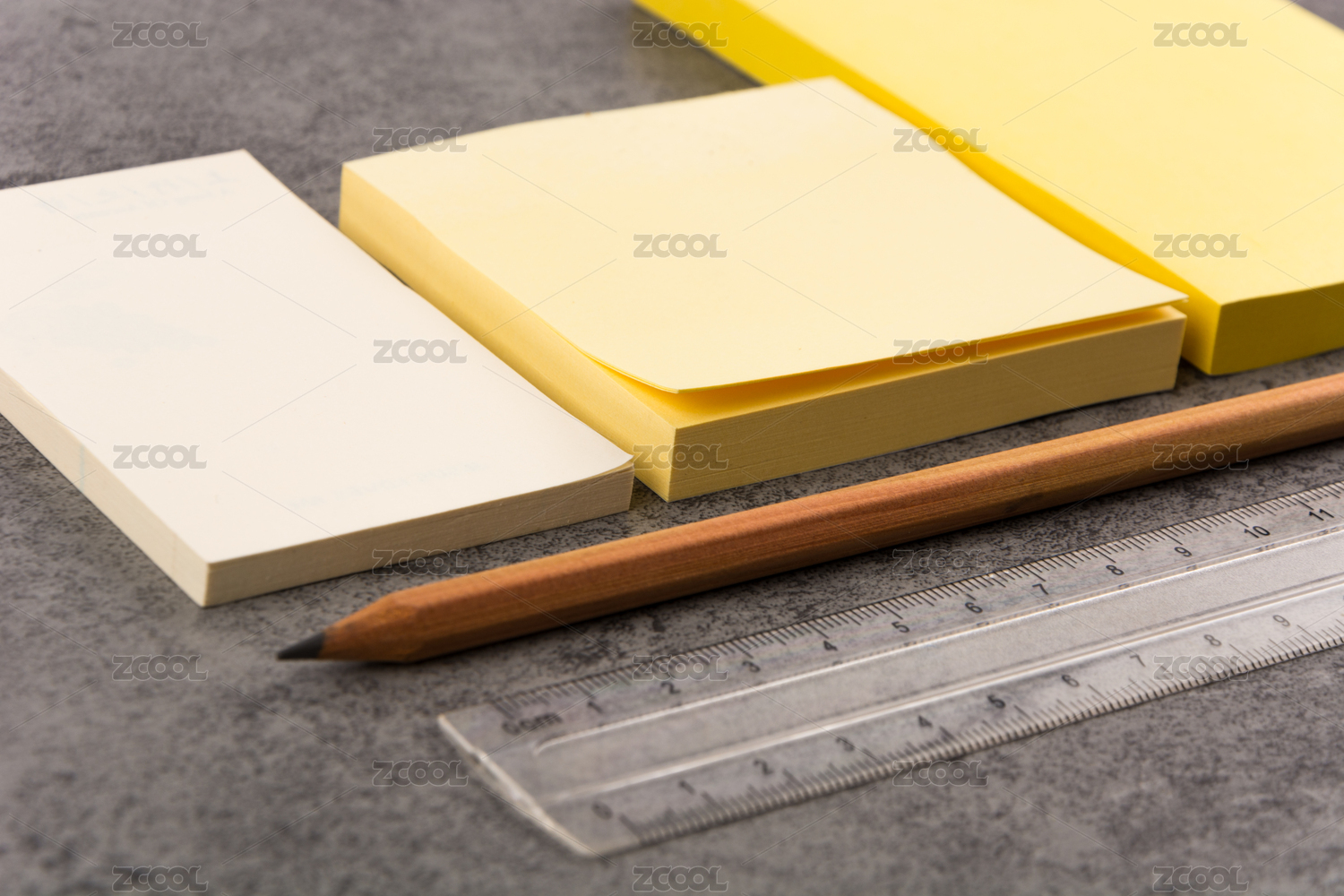 Colorful stationery on wooden background