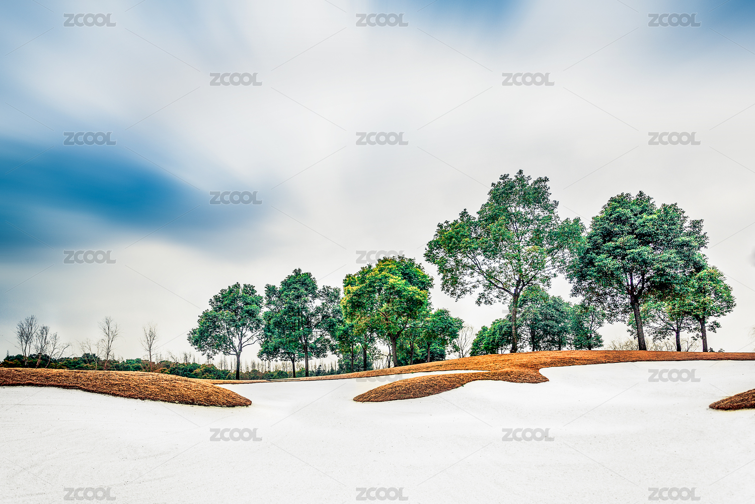 Sand bunker on golf course, landscape view
